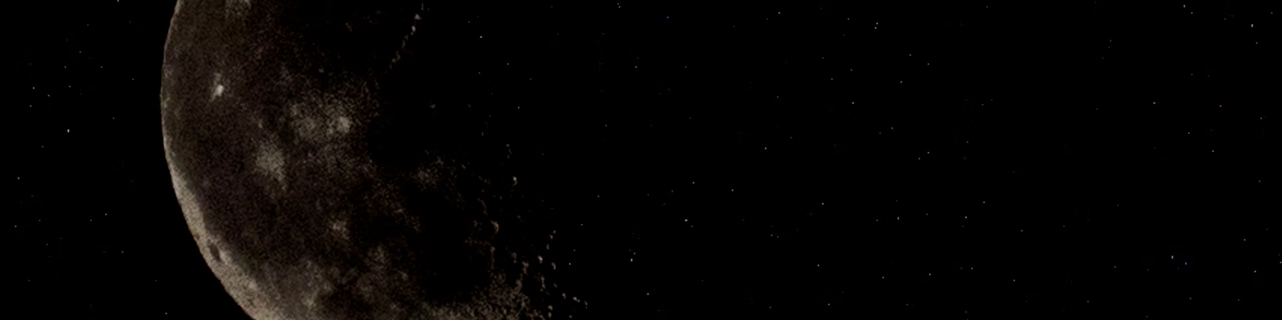 The moon on a dark night.